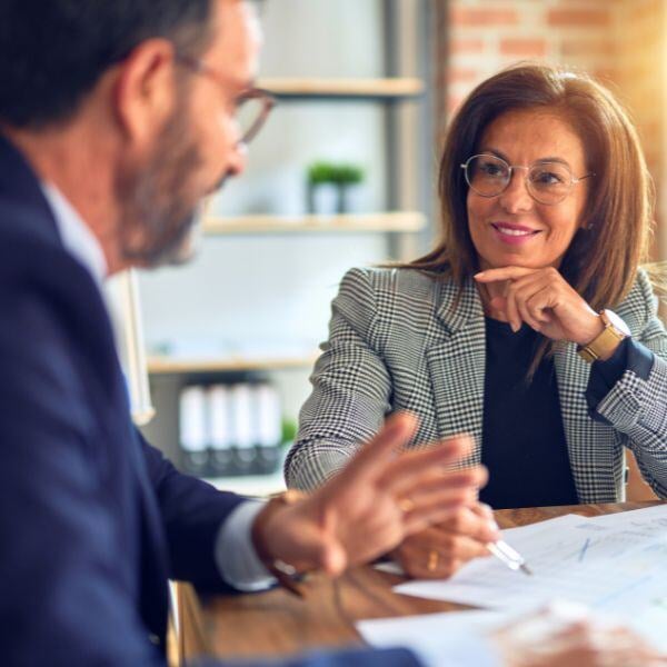 Man in a meeting with a female financial advisor.