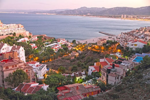 Landscape of the Spanish coastline with properties and the sea