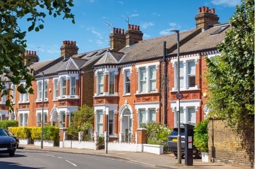 A row of terraced houses on a sunny summer day in London, England